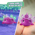 Fingerlings Interactive Baby Axolotl, Ziggy (Magenta), Swims & Lights Up
